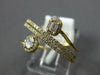 .50CT DIAMOND 18KT YELLOW GOLD ROUND BAGUETTE & OVAL MULTI ROW CRISS CROSS RING