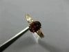 1.40CT ROUND DIAMOND & OVAL RHODOLITE 14KT ROSE GOLD THREE STONE ENGAGEMENT RING