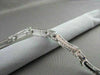 ANTIQUE 5.74CT WIDE 18KT GOLD DIAMOND BAGUETTE & ROUND BRACELET