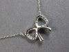 ESTATE SMALL .07CT DIAMOND 14KT WHITE & YELLOW GOLD 3D CLASSIC BOW LOVE NECKLACE