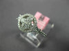 ESTATE .82CT DIAMOND 18K WHITE GOLD 3D ROUND & PRINCESS 4 STONE FLOWER HALO RING
