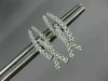 ESTATE .31CT ROUND DIAMOND 18KT WHITE GOLD CLASSIC CRISS CROSS HANGING EARRINGS