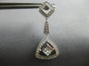 LARGE .96CT DIAMOND 18KT WHITE GOLD ROUND & PRINCESS TRIANGULAR HANGING EARRINGS
