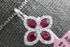 ESTATE .53CT DIAMOND & AAA RUBY 14KT WHITE GOLD MULTI LEAF FLOWER LOVE PENDANT