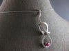 LARGE .70CT DIAMOND & AAA RUBY 14KT WHITE GOLD 3D INFINITY MUSICAL NOTE PENDANT
