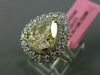 LARGE GIA 4.25CT WHITE & FANCY YELLOW DIAMOND 18KT TWO TONE GOLD ENGAGEMENT RING