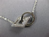 ESTATE .29CT DIAMOND 18KT WHITE GOLD CIRCLE OF LIFE SQUARE LOVE KNOT FUN PENDANT