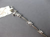 ESTATE .4CT DIAMOND 14K WHITE GOLD BEZEL ETOILE BY THE YARD LOVE TENNIS BRACELET