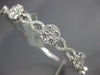 ESTATE WIDE 1.76CT DIAMOND 18KT WHITE GOLD 3D INFINITY FLOWER BANGLE BRACELET