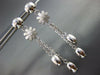 ESTATE LARGE .05CT DIAMOND 18KT WHITE GOLD MATTE & SHINY FLOWER HANGING EARRINGS