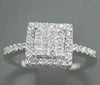 ESTATE .5CT DIAMOND 14KT WHITE GOLD ROUND & PRINCESS INVISIBLE SQUARE LOVE RING