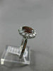ESTATE 1.45CT DIAMOND & NATURAL GARNET 18KT WHITE GOLD OVAL HALO ENGAGEMENT RING