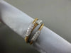 ESTATE .27CT DIAMOND 18KT WHITE & ROSE GOLD 3D 3 ROW CRISS CROSS FLEXIBLE RING