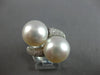LARGE .93CT DIAMOND & AAA SOUTH SEA PEARL 18KT WHITE GOLD CRISS CROSS LOVE RING