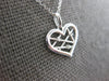 ESTATE .01CT DIAMOND 14K WHITE GOLD ROUND CRISS CROSS HEART FUN FLOATING PENDANT