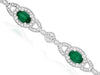 4.18CT DIAMOND & AAA EMERALD 14KT WHITE GOLD OVAL & ROUND HALO TENNIS BRACELET