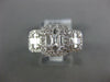 ESTATE WIDE .86CT DIAMOND 18K WHITE GOLD ROUND & BAGUETTE CLUSTER HALO LOVE RING