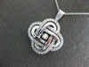 ESTATE LARGE 1.16CT DANCING DIAMOND 14KT WHITE GOLD 3D LOVE KNOT FLOWER PENDANT