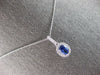 1.28CT DIAMOND & AAA CEYLON SAPPHIRE 14KT WHITE GOLD OVAL HALO FLOATING PENDANT