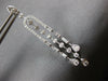 LONG 1.25CT DIAMOND 14KT WHITE GOLD ROUND & BAGUETTE HORSESHOE HANGING EARRINGS