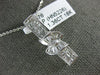 ESTATE 1.36CT DIAMOND 18KT WHITE GOLD PRINCESS ROUND & BAGUETTE BAR BOW PENDANT