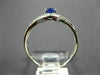 ESTATE .40CT DIAMOND & AAA TANZANITE 14KT WHITE GOLD CLASSIC LOVE KNOT FUN RING
