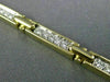 ESTATE 1.0CT DIAMOND 14KT WHITE & YELLOW GOLD CROSS RECTANGULAR TENNIS BRACELET