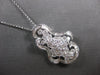 EXTRA LARGE 2.55CT DIAMOND 18KT WHITE GOLD ROUND & BAGUETTE FLORAL LOVE PENDANT