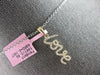 ESTATE .16CT DIAMOND 14KT YELLOW GOLD 3D CLASSIC SCRIPT LOVE FLOATING PENDANT