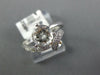 ESTATE 1.33CT DIAMOND & AAA WHITE TOPAZ 14KT WHITE GOLD LOVE KNOT SOLITAIRE RING
