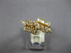 1.0CT DIAMOND 14KT YELLOW GOLD MARQUISE & BAGUETTE CRISS CROSS ANNIVERSARY RING