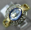 ESTATE .92CT DIAMOND & AAA OVAL TANZANITE 14KT YELLOW GOLD SEMI BEZEL LOVE RING