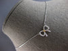 ESTATE SMALL .07CT DIAMOND 14KT WHITE & YELLOW GOLD 3D CLASSIC BOW LOVE NECKLACE