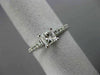 ESTATE .66CT ROUND & PRINCESS DIAMOND 14KT WHITE GOLD SOLITAIRE ENGAGEMENT RING
