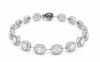 4.07CT DIAMOND 18KT WHITE GOLD ROUND & BAGUETTE OVAL BY THE YARD TENNIS BRACELET