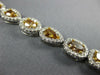 WIDE 8.79CT MULTI COLOR DIAMOND 18KT WHITE GOLD MULTI SHAPE HALO TENNIS BRACELET