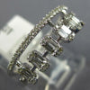 WIDE .45CT DIAMOND 14KT WHITE GOLD 3D ROUND & BAGUETTE CLUSTER ANNIVERSARY RING