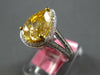 LARGE 2.68CT WHITE & FANCY YELLOW DIAMOND 18KT 2 TONE GOLD HALO ENGAGEMENT RING