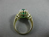 ESTATE 1.82CT ROUND & BAGUETTE DIAMOND & AAA EMERALD 14K TWO TONE GOLD HALO RING