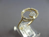 ESTATE .31CT DIAMOND 14K YELLOW GOLD 3D ROUND & BAGUETTE OPEN OVAL FUN RING