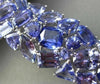 ESTATE MASSIVE 82.92CT TANZANITE 18KT WHITE GOLD 3D MULTI SHAPE TENNIS BRACELET