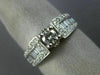 ESTATE .90CT ROUND & BAGUETTE DIAMOND 14KT WHITE GOLD FOUR PRONG ENGAGEMENT RING