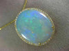 ESTATE EXTRA LARGE 14.04CT DIAMOND & AAA OPAL 14KT YELLOW GOLD OVAL HALO PENDANT