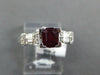 1.61CT DIAMOND & AAA RUBY 18KT WHITE GOLD 3D EMERALD CUT & ROUND ENGAGEMENT RING
