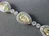 ESTATE LONG 6.23CT WHITE & FANCY YELLOW DIAMOND 18KT WHITE GOLD TENNIS BRACELET