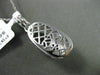 ESTATE .57CT DIAMOND & RUBY 14KT WHITE GOLD FILIGREE MILGRAIN BABY SHOE PENDANT