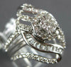 LARGE .77CT DIAMOND 14KT WHITE GOLD ROUND & BAGUETTE FLOWER LEAF ENGAGEMENT RING