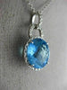 ESTATE LARGE 6.60CT DIAMOND & BLUE TOPAZ 14KT WHITE GOLD HALO ROUND HALO PENDANT