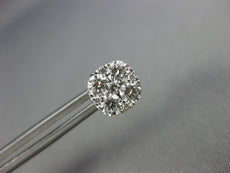 1.09CT DIAMOND 18KT WHITE GOLD 3D ROUND CLUSTER INVISIBLE SQUARE STUD EARRINGS