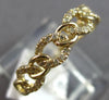 ESTATE .20CT DIAMOND 14KT YELLOW GOLD 5MM CLASSIC LOVE KNOT OVAL LINK FUN RING